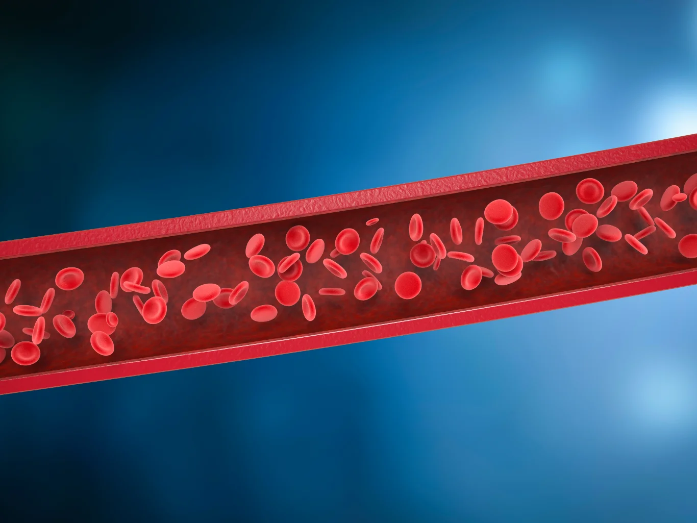 A microscopic 3D rendering of red blood cells (erythrocytes) traveling through a translucent red blood vessel against a deep blue background